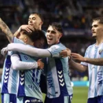 Los jugadores del Málaga CF celebran un gol marcado ante el Burgos CF
